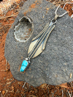 Golden Vessel with Turquoise Drop