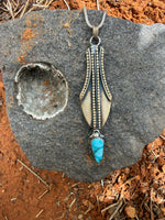 Golden Vessel with Turquoise Drop