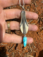 Golden Vessel with Turquoise Drop
